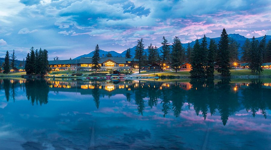 Fairmont Jasper Park Lodge at twilight on the lake