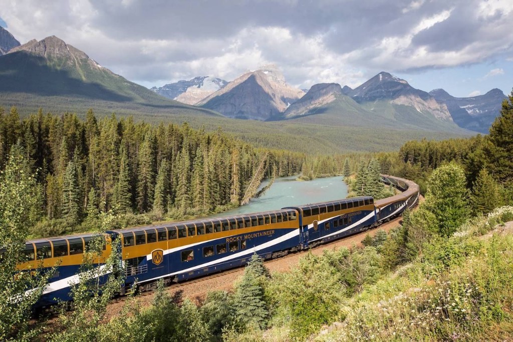 Rocky Mountaineer train winding through the Canadian Rockies