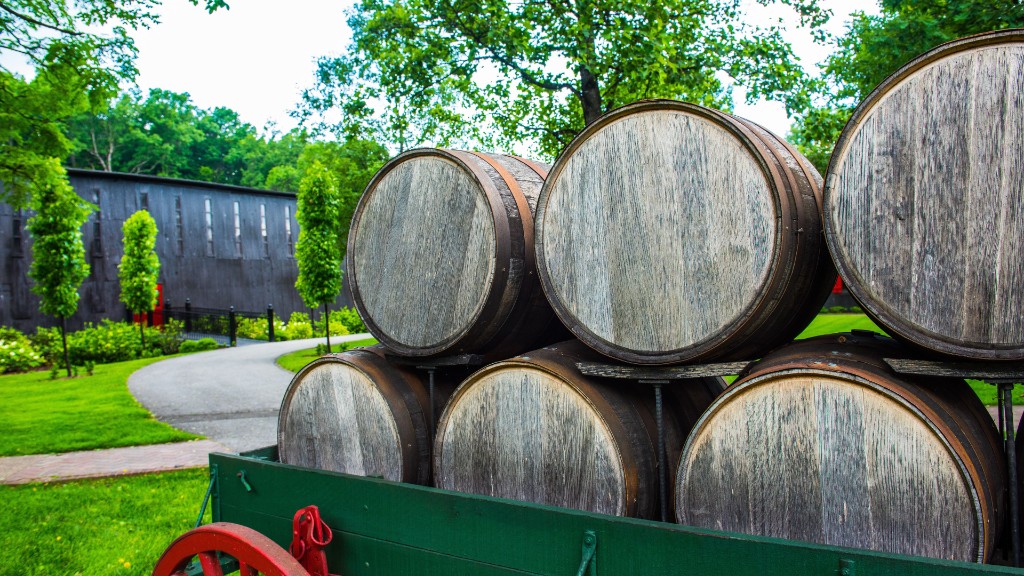 Distillery with bourbon barrels and historic building in Kentucky bourbon country
